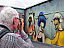 Taking a photo of the Miss Van mural.